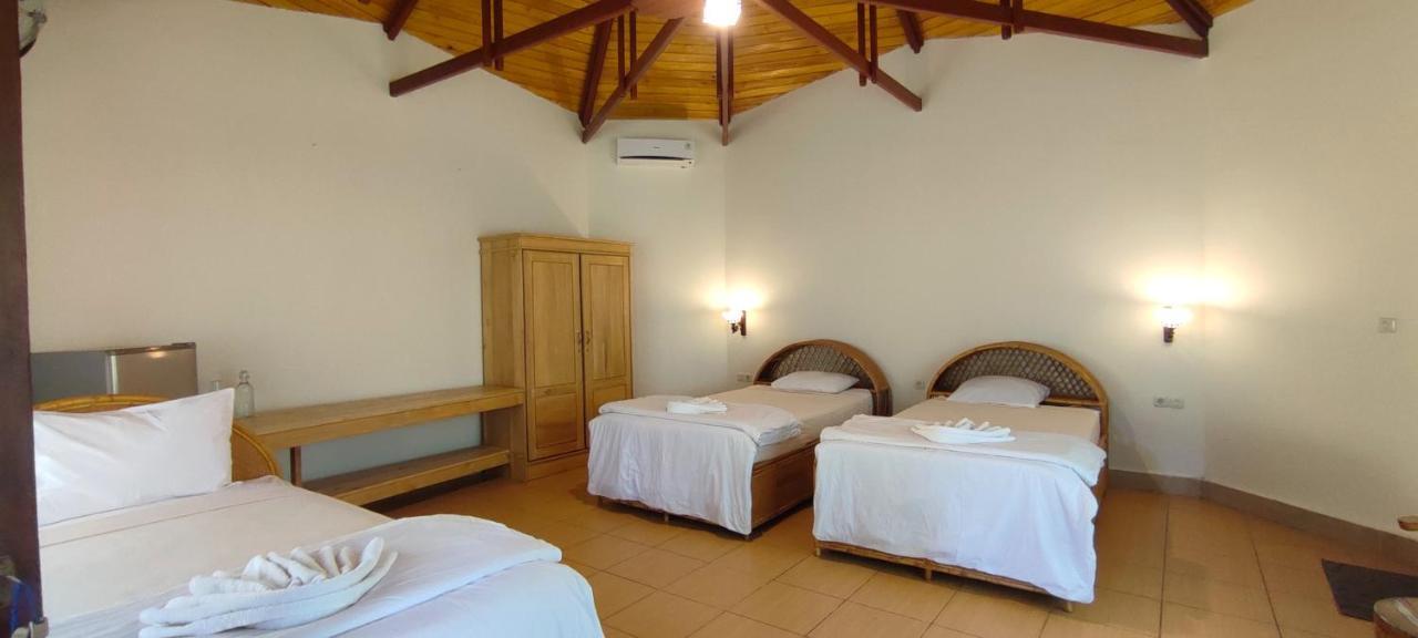 Bara Beach Bungalows Bira Luaran gambar
